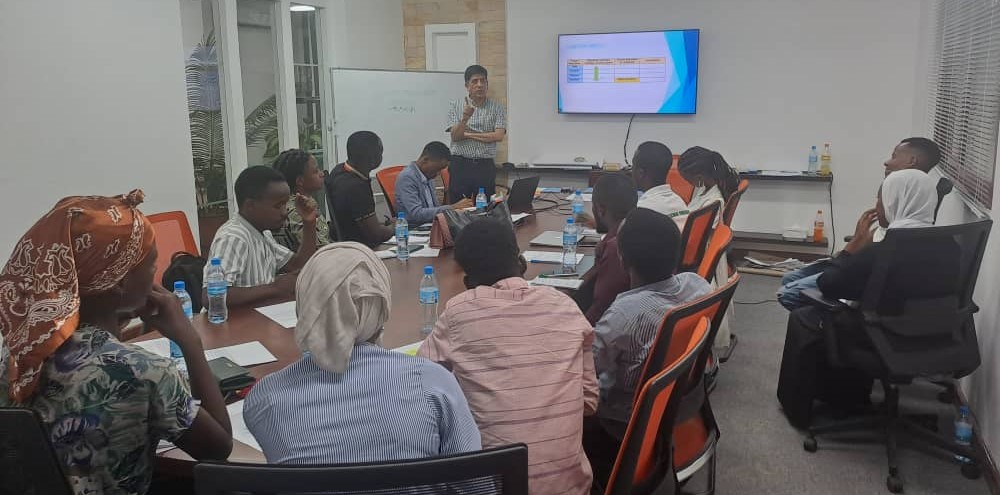  Dr. Mansoor Ali delivering a capacity building workshop to young professionals in Dar es Salaam.